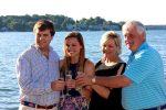Family cheers their wine