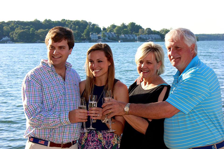 Family cheers their wine