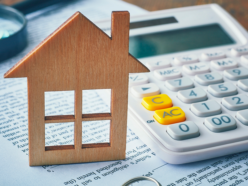 calculator with wood house