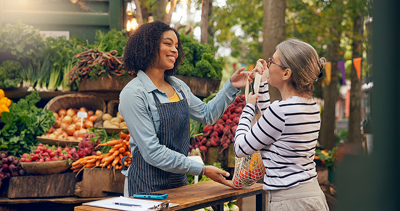Regular client purchasing multiple bulk items at local market